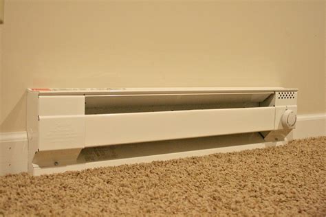 how many electric box heaters needed to heat a home|electric baseboard heater wattage.